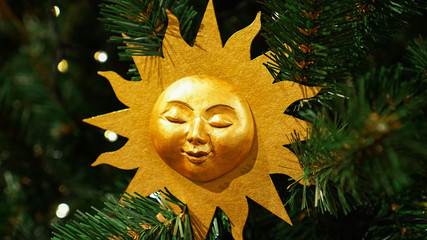 Christmas decorations on the Christmas tree. The sun.