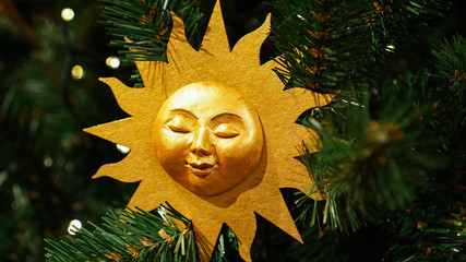 Christmas decorations on the Christmas tree. The sun.