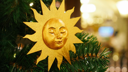 Christmas decorations on the Christmas tree. The sun.