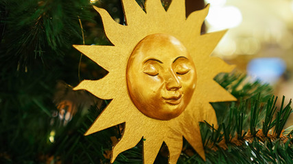 Christmas decorations on the Christmas tree. The sun.