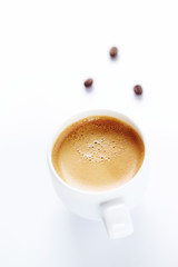 Cup of coffee on white background.  Copy space.