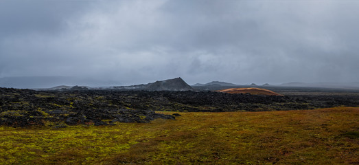 Frozen lavas field in the geothermal valley Leirhnjukur, near Krafla volcano. Location: valley Leirhnjukur, Myvatn region, North part of Iceland, Europe. September 2019