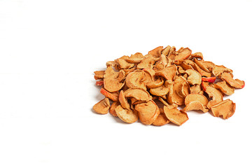 Sprinkled dried apples on a white wooden background. Frame, copy space