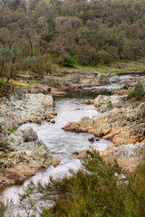 Consumnis river california running through canyon .