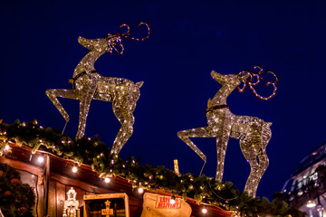 Christmas  Magic Reindeers and flickering lights at Christmas fair