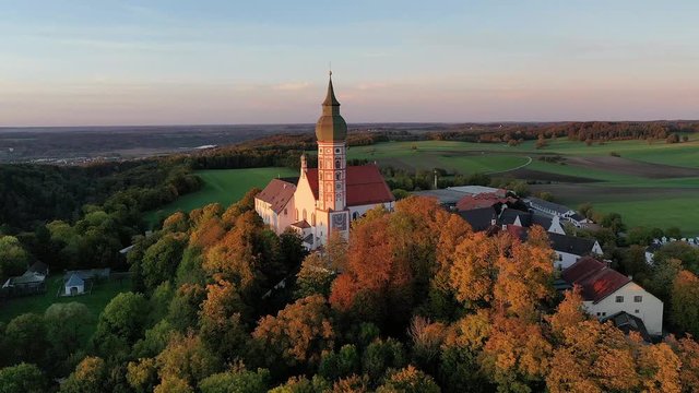 Flight at Andechs Monastery, aerial view at sunrise, Ammersee, F&uuml;nfseenland, Pfaffenwinkel, Upper Bavaria, Bavaria, Germany,