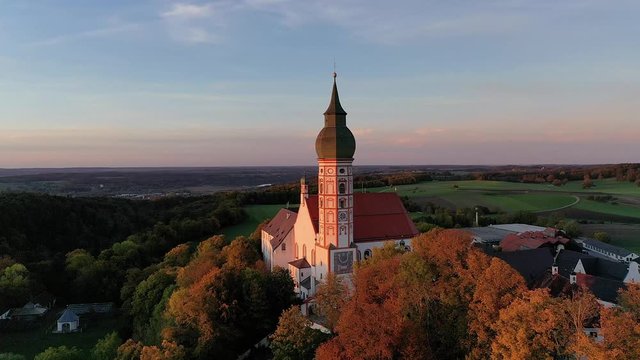 Flight at Andechs Monastery, aerial view at sunrise, Ammersee, F&uuml;nfseenland, Pfaffenwinkel, Upper Bavaria, Bavaria, Germany,
