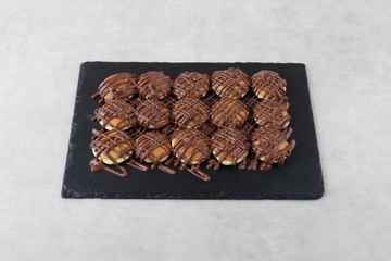pancake with chocolate and pistachio on a texture background 