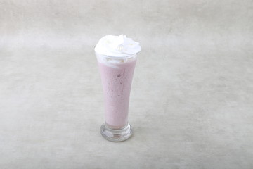  berry smoothie juice on glass on a white background 