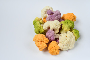 cauliflower green yellow purple and white color on a light background.  healthy eating concept. organic food, vegan veggarian recipe . isolate on a light background, selective focus