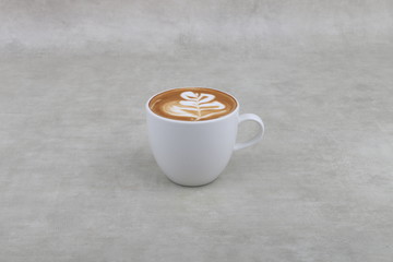Coffee Cup and latte art foam  with copy space for Text - Coffee in a white cup isolated on a white background - Cappuccino Latte Espresso Macchiato  