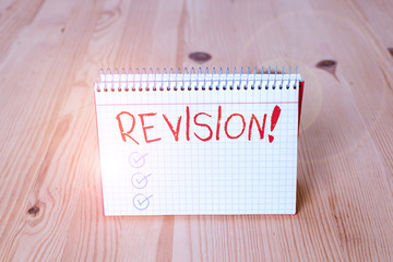 Handwriting text writing Revision. Conceptual photo action of revising over someone like auditing or accounting Empty reminder wooden floor background spiral notebook groove slot office