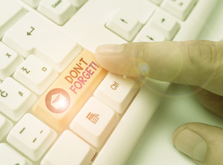 Handwriting text Don T Forget. Conceptual photo used to remind someone about important fact or...