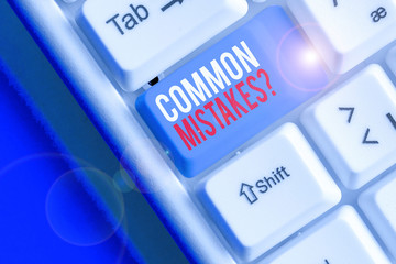 Writing note showing Common Mistakes Question. Business concept for repeat act or judgement...