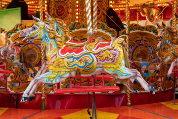Fairground carousel with lights at Christmas