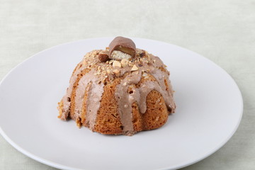 cake on a white plate on a texture background 