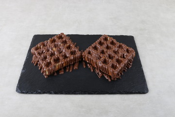 waffle with chocolate and pistachio an lotus biscuit and nutella