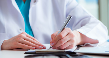 Fototapeta premium Doctor with prescribed medicines in medical concept