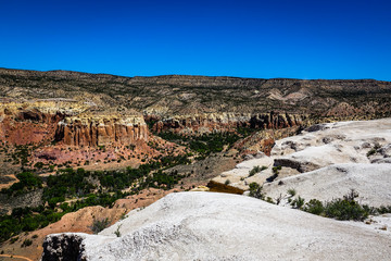 Fototapeta na wymiar Amazing panorama from Kitchen Mesa Trail, Ghost Ranch, New Mexico, United States