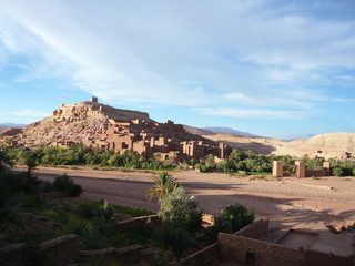 Fototapeta premium Aït Benhaddou is an ighrem (fortified village) along the former caravan route between the Sahara and Marrakech in present-day Morocco. Wadi and adobe walls 