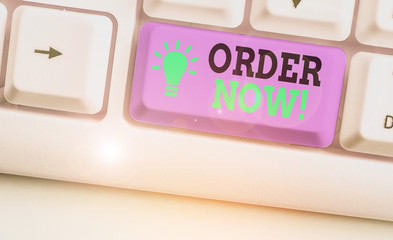 Writing note showing Order Now. Business concept for confirmed request by one party to another to...