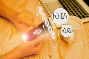 Writing note showing Holiday Hours. Business concept for Overtime work on for employees under...