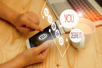 Writing note showing You Deserve It. Business concept for should have it because of their qualities or actions