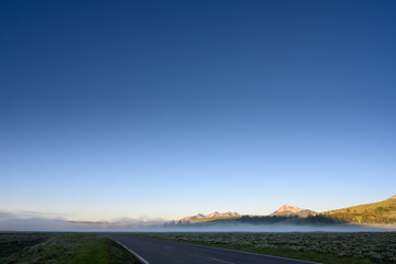 Fototapeta premium Fog Wafting Across Yellowstone Field