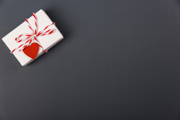 Valentine's day Concept, flat lay top view, White Gift Box and Red Heart