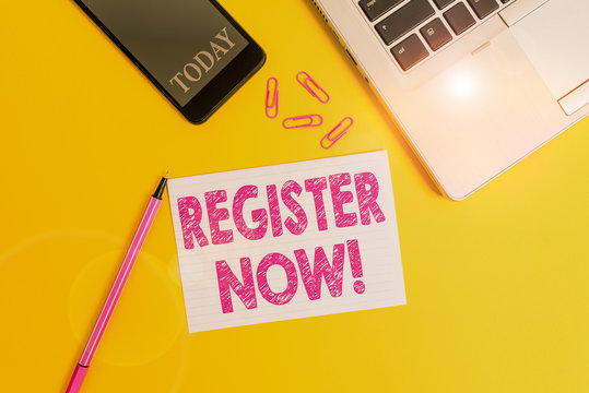 Word writing text Register Now. Business photo showcasing official list or record showing or things into web or forum Trendy open laptop smartphone marker paper sheet clips colored background