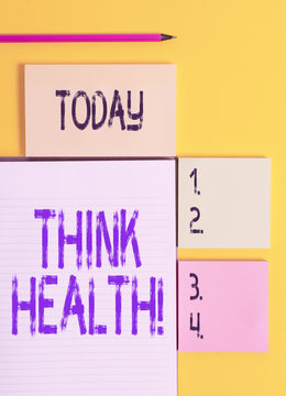 Handwriting text Think Health. Conceptual photo state of complete physical mental and social well being Colored empty papers with copy space on the yellow background table