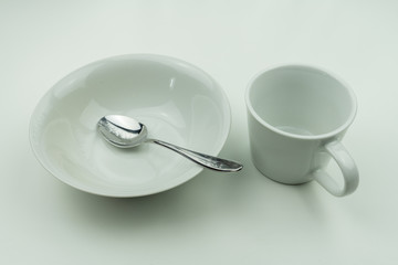 Empty White dishes  and silver cutlery