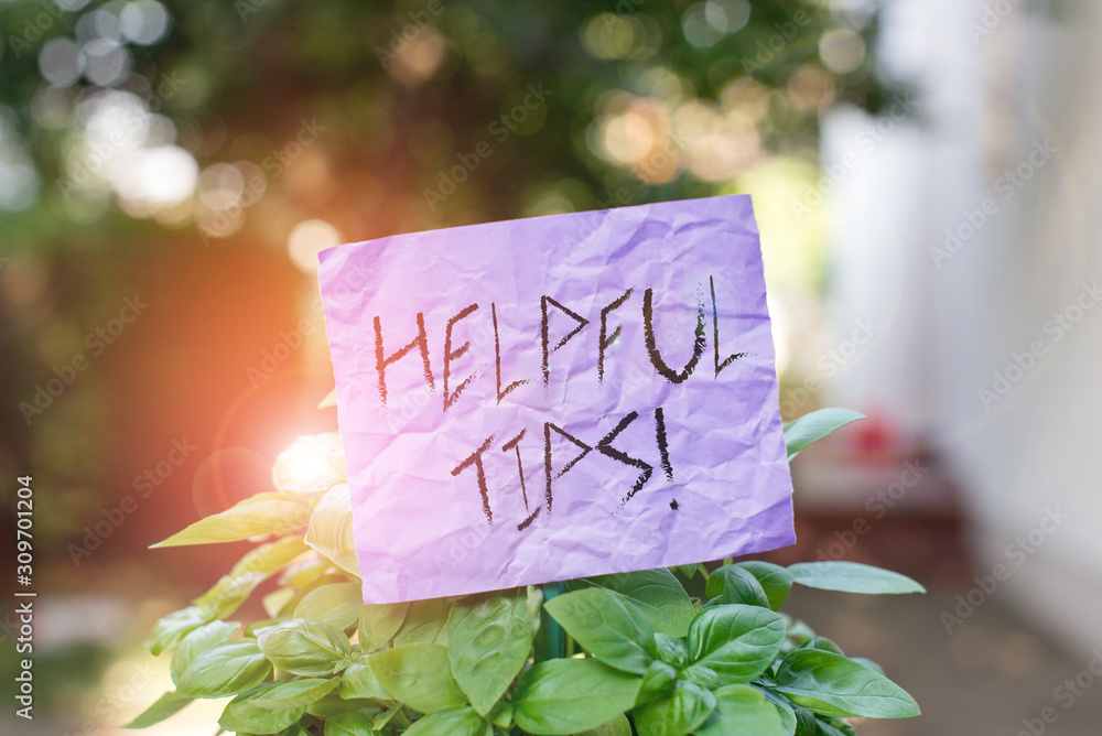Aufkleber text sign showing helpful tips. business photo showcasing advices given to be helpful knowledge in l