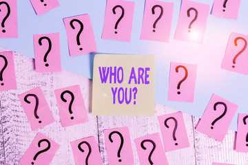 Conceptual hand writing showing Who Are You Question. Concept meaning asking about its identity or...