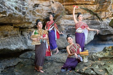 Asian Portrait of Beautiful Thai girl in national costume : thai dance.