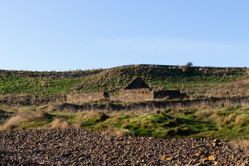 Abandoned coastal cottage