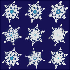 Kit of isolated  silhouettes of snowflakes on blue background.