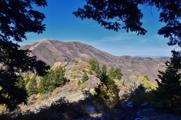 Butterfield canyon hiking path views of the Oquirrh range along the Wasatch Front Rocky Mountains, by Kennecott Rio Tinto Copper mine, Tooele and Salt Lake City fall. Utah, United States.