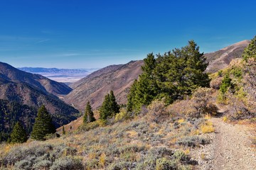 Butterfield canyon hiking path views of the Oquirrh range along the Wasatch Front Rocky Mountains, by Kennecott Rio Tinto Copper mine, Tooele and Salt Lake City fall. Utah, United States.