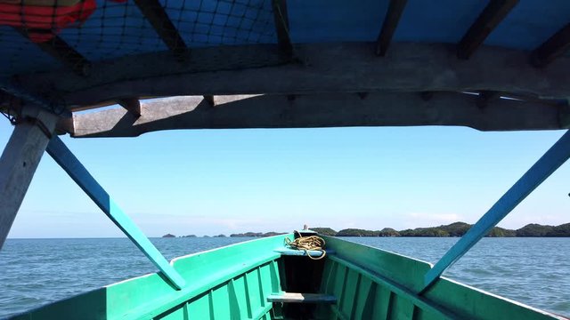 Sailing around the Hundred Islands in a Bangka Boat in the Summer Season, located in Alaminos, Pangasinan, Zambales, in the Philippines