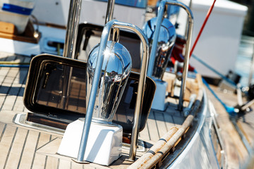 Beautiful wooden deck of a snow-white yacht