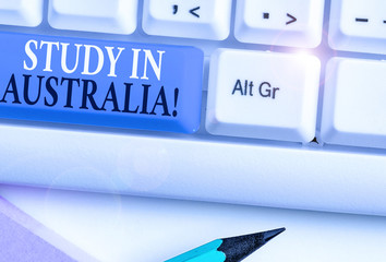 Conceptual hand writing showing Study In Australia. Concept meaning going into foreign country...