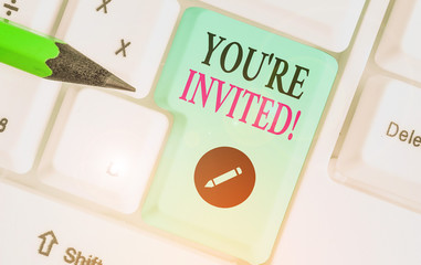 Writing note showing You Re Invited. Business concept for make a polite friendly request to someone...