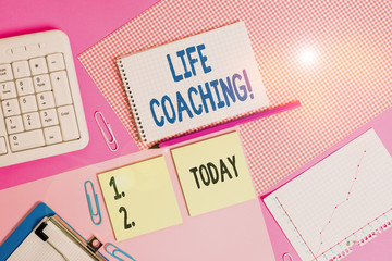 Conceptual hand writing showing Life Coaching. Concept meaning demonstrating employed to help showing attain their goals in career Writing equipments and computer stuffs placed on plain table