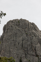 People on a Large Rock