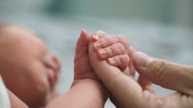 Newborn Baby Five Days Old Lies On A Diaper