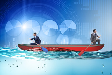 Disagreement concept with businessmen rowing in different direct