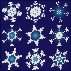 Kit of simple christmas snowflakes on blue background.