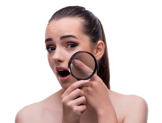 Woman in beauty concept with magnifying glass aging wrinkles