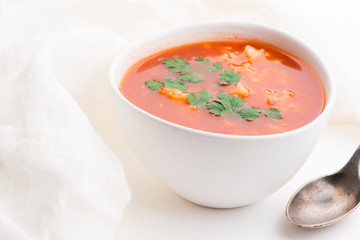 Tomato soup with rice decorated with parsley